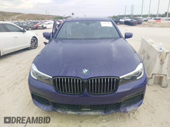 2018 BMW 7 Series 740i with VIN WBA7E2C58JB216314, listed as a IAAI auction lot 41867480 with 62,678 mi miles. Bid and sale history available at carsss.com. Image 12.