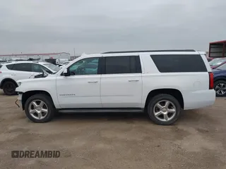 2015 Chevrolet Suburban LT with VIN 1GNSKJKC7FR547276, listed as a IAAI auction lot 42041289 with 189,075 mi miles and . Bid and sale history available at DreamBid. Image 15.