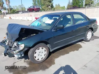 1999 Honda Accord LX with VIN JHMCG6659XC019748, listed as a IAAI auction lot 42141554 with 331,904 mi miles and . Bid and sale history available at DreamBid. Image 2.