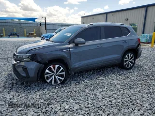 2022 Volkswagen Taos SE z VIN 3VVLX7B25NM020380, wystawiony jako Copart lot #52543585 z przebiegiem 28 912 mil mil oraz Szkody całkowita. Historia ofert i sprzedaży dostępna na DreamBid. Obrazek 1.
