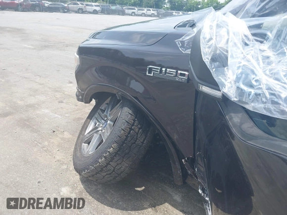2020 Ford F-150 XL with VIN 1FTEW1E58LKE77945, listed as a IAAI auction lot 42487753 with 88,218 mi miles and . Bid and sale history available at DreamBid. Image 6.