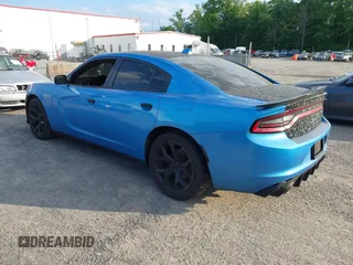 2015 Dodge Charger SXT with VIN 2C3CDXHG1FH848019, listed as a IAAI auction lot 42124399 with 175,247 mi miles and . Bid and sale history available at DreamBid. Image 3.