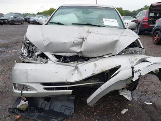 2003 Toyota Camry LE with VIN 4T1BE32K63U755835, listed as a IAAI auction lot 41976402 with 215,788 mi miles and . Bid and sale history available at DreamBid. Image 13.