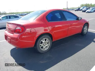 2004 Dodge Neon SXT with VIN 1B3ES56C24D578647, listed as a IAAI auction lot 41931066 with 134,245 mi miles. Bid and sale history available at carsss.com. Image 4.