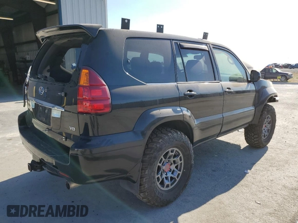 2005 Lexus GX 470 with VIN JTJBT20X650068722, listed as a Copart auction lot 62931984 with 247,819 mi miles and Salvage Title. Bid and sale history available at carsss.com. Image 3.