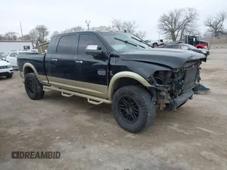 2013 Ram 2500 Longhorn with VIN 3C6UR5PL8DG535266, listed as a IAAI auction lot 41656359 with 202,487 mi miles and . Bid and sale history available at DreamBid. Image 1.