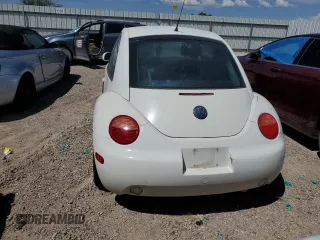 2001 Volkswagen Beetle GLX z VIN 3VWDD21C71M435250, wystawiony jako Copart lot #65546334 z przebiegiem 189 542 mil mil oraz Szkoda całkowita • Salvage title. Historia ofert i sprzedaży dostępna na DreamBid. Obrazek 6.