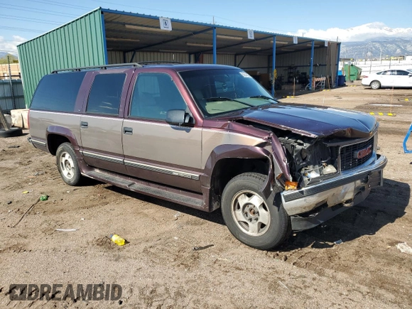 1997 GMC Suburban with VIN 3GKFK16R4VG518331, listed as a Copart auction lot 56241425 with 265,201 mi miles and Non repairable. Bid and sale history available at DreamBid. Image 4.