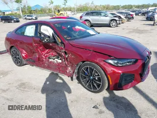 2024 BMW i4 eDrive40 with VIN WBY73AW01RFS33462, listed as a IAAI auction lot 41561527 with 8,130 mi miles. Bid and sale history available at carsss.com. Image 1.