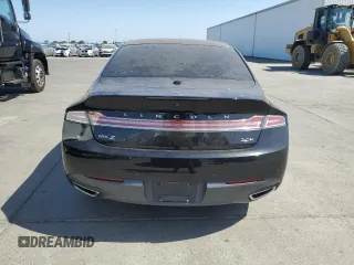 2015 Lincoln MKZ Hybrid z VIN 3LN6L2LU4FR618647, wystawiony jako Copart lot #58937985 z przebiegiem 113 765 mil mil oraz Szkoda całkowita • Salvage title. Historia ofert i sprzedaży dostępna na DreamBid. Obrazek 6.