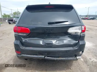 2015 Jeep Grand Cherokee Altitude z VIN 1C4RJFAG5FC682058, wystawiony jako IAAI lot #42352814 z przebiegiem 228 067 mil mil oraz . Historia ofert i sprzedaży dostępna na DreamBid. Obrazek 16.