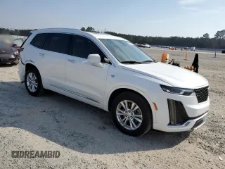 2024 Cadillac XT6 FWD Luxury z VIN 1GYKPAR47RZ705252, wystawiony jako Copart lot #49244015 z przebiegiem 26 838 mil mil oraz Szkody całkowita. Historia ofert i sprzedaży dostępna na DreamBid. Obrazek 4.