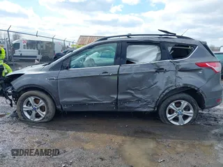 2013 Ford Escape SE with VIN 1FMCU9GX6DUA83081, listed as a IAAI auction lot 41991167 with 106,793 mi miles and . Bid and sale history available at DreamBid. Image 15.