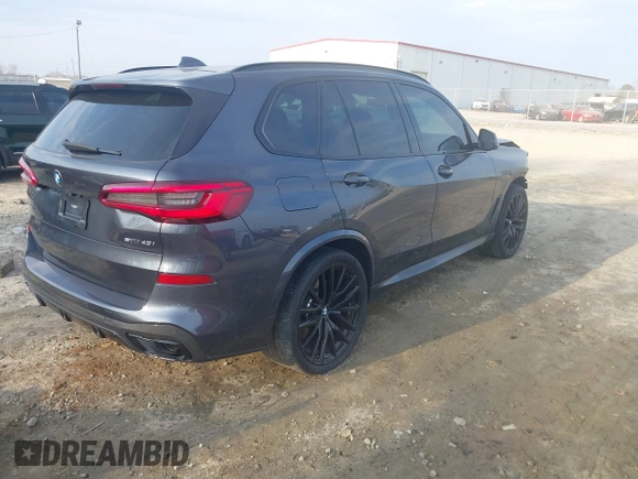 2020 BMW X5 sDrive40i with VIN 5UXCR4C06LLW64438, listed as a IAAI auction lot 41520407 with 89,868 mi miles and . Bid and sale history available at DreamBid. Image 4.