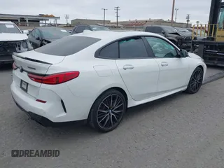 2022 BMW 2 Series M235i xDrive with VIN WBA13AL0XN7J95517, listed as a IAAI auction lot 42682823 with 16,069 mi miles and . Bid and sale history available at DreamBid. Image 4.