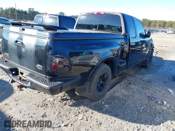 1999 Ford F-150 XL with VIN 1FTRX07L3XKC15874, listed as a IAAI auction lot 41363405 with Not Provided miles. Bid and sale history available at carsss.com. Image 4.