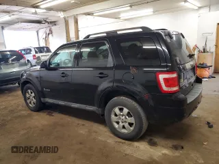 2010 Ford Escape Hybrid with VIN 1FMCU4K30AKC25228, listed as a Copart auction lot 60322835 with 207,629 mi miles and Salvage title. Bid and sale history available at DreamBid. Image 2.