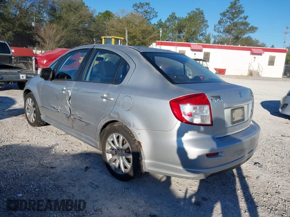 2010 Suzuki SX4 with VIN JS2YC5A46A6310134, listed as a IAAI auction lot 41696108 with 147,059 mi miles and . Bid and sale history available at DreamBid. Image 3.
