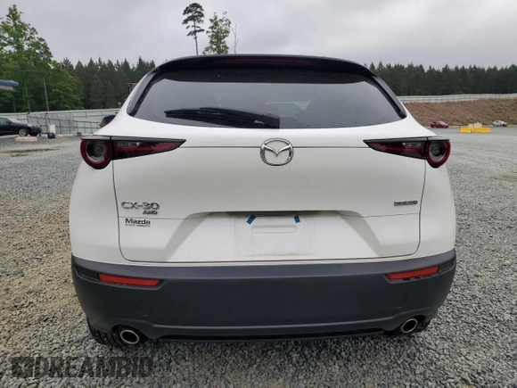 2025 Mazda CX-30 S with VIN 3MVDMBAM2SM764529, listed as a Copart auction lot 54394175 with 7,095 mi miles and Salvage title. Bid and sale history available at DreamBid. Image 6.