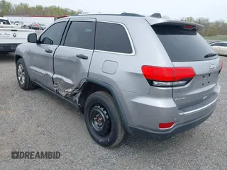 2015 Jeep Grand Cherokee Limited z VIN 1C4RJFBG6FC717026, wystawiony jako IAAI lot #42078788 z przebiegiem 106 755 mil mil oraz . Historia ofert i sprzedaży dostępna na DreamBid. Obrazek 3.