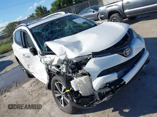 2018 Toyota RAV4 XLE with VIN JTMWFREV8JJ157496, listed as a IAAI auction lot 41816017 with 64,767 mi miles. Bid and sale history available at carsss.com. Image 6.