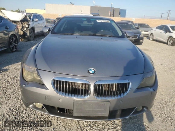 2004 BMW 6 Series 645Ci z VIN WBAEH73434B190924, wystawiony jako Copart lot #74318214 z przebiegiem 121 317 mil mil oraz Czysty tytuł • Clean title. Historia ofert i sprzedaży dostępna na DreamBid. Obrazek 5.