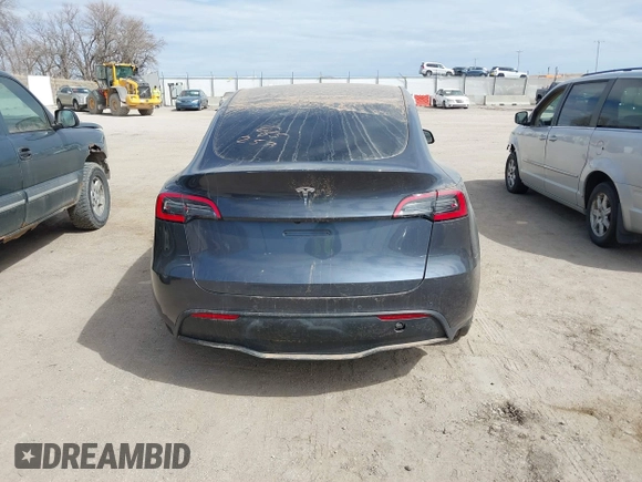 2022 Tesla Model Y Long Range with VIN 7SAYGDEE5NF534259, listed as a IAAI auction lot 41860246 with 24,513 mi miles and . Bid and sale history available at carsss.com. Image 16.