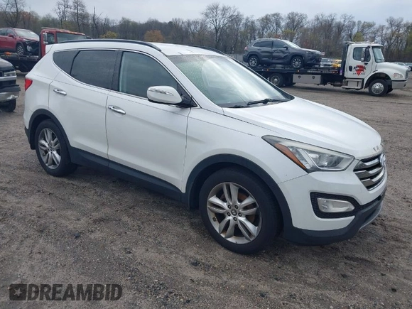2013 Hyundai Santa Fe Sport z VIN 5XYZUDLA8DG079795, wystawiony jako IAAI lot #42035743 z przebiegiem 170 321 mil mil oraz . Historia ofert i sprzedaży dostępna na DreamBid. Obrazek 1.