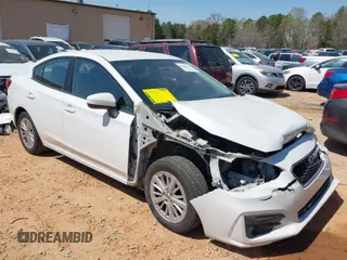 2017 Subaru Impreza Premium with VIN 4S3GKAB63H3617614, listed as a IAAI auction lot 41908948 with 102,722 mi miles. Bid and sale history available at carsss.com. Image 1.