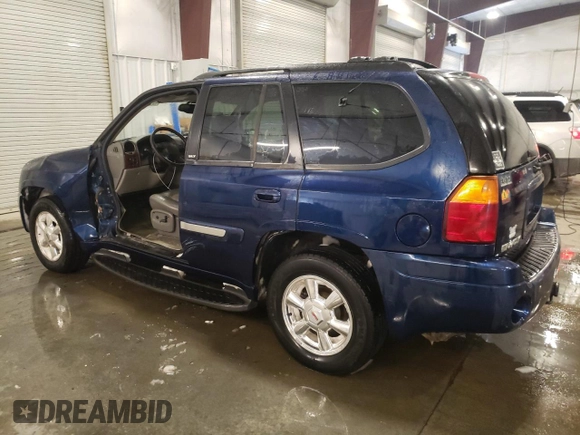2003 GMC Envoy SLT with VIN 1GKDT13S132184373, listed as a Copart auction lot 46138705 with 130,612 mi miles and Salvage Title. Bid and sale history available at carsss.com. Image 2.