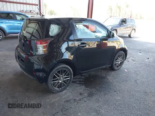 2012 Scion iQ with VIN JTNJJXB00CJ016247, listed as a IAAI auction lot 42117563 with 105,809 mi miles. Bid and sale history available at carsss.com. Image 4.