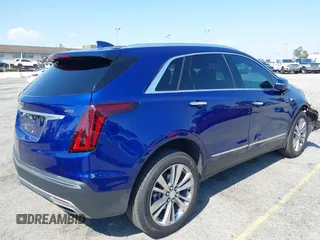 2023 Cadillac XT5 FWD Premium Luxury z VIN 1GYKNCRS3PZ176654, wystawiony jako IAAI lot #42136259 z przebiegiem 20 403 mil mil oraz . Historia ofert i sprzedaży dostępna na DreamBid. Obrazek 4.