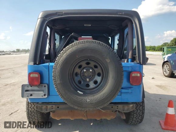 2002 Jeep Wrangler X with VIN 1J4FA39S92P776435, listed as a Copart auction lot 62792235 with 182,385 mi miles and Salvage title. Bid and sale history available at DreamBid. Image 6.
