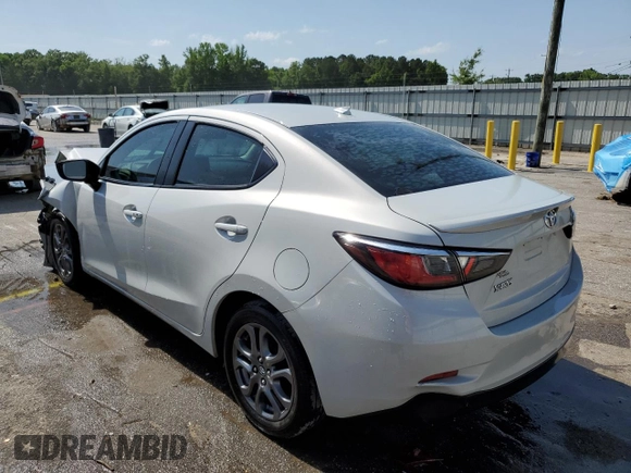 2019 Toyota Yaris L z VIN 3MYDLBYV7KY519027, wystawiony jako Copart lot #57104345 z przebiegiem Nie podano mil oraz Szkoda całkowita • Salvage title. Historia ofert i sprzedaży dostępna na DreamBid. Obrazek 2.