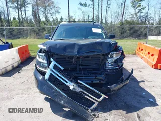2020 Chevrolet Tahoe LT with VIN 1GNSKBKC3LR176828, listed as a IAAI auction lot 41781047 with 62,840 mi miles and . Bid and sale history available at DreamBid. Image 12.