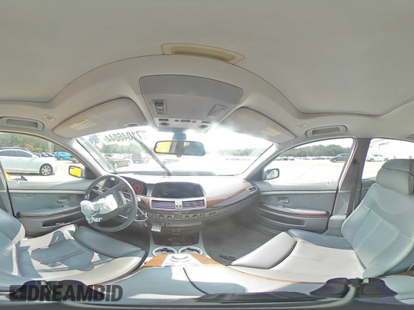 2004 BMW 7 Series 745Li with VIN WBAGN63444DS47664, listed as a Copart auction lot 71046044 with 144,598 mi miles and Salvage title. Bid and sale history available at DreamBid. Image 12.