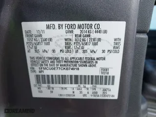 2012 Ford Escape Limited with VIN 1FMCU0E77CKB74918, listed as a IAAI auction lot 42014267 with 176,861 mi miles. Bid and sale history available at carsss.com. Image 9.