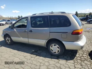 1998 Toyota Sienna LE z VIN 4T3ZF13C4WU006180, wystawiony jako Copart lot #50349795 z przebiegiem 237 600 mil mil oraz Szkoda całkowita • Salvage title. Historia ofert i sprzedaży dostępna na DreamBid. Obrazek 2.