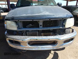 2000 Ford F-150 XL z VIN 1FTRX18L1YNA05567, wystawiony jako IAAI lot #42054536 z przebiegiem 245 018 mil mil oraz . Historia ofert i sprzedaży dostępna na DreamBid. Obrazek 6.