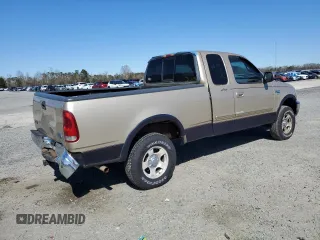 1999 Ford F-150 XL with VIN 1FTRX18LXXNA59898, listed as a Copart auction lot 49326055 with 0 mi miles and Salvage Title. Bid and sale history available at carsss.com. Image 3.