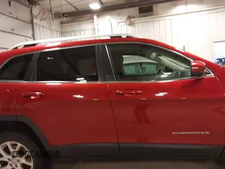 2015 Jeep Cherokee Latitude with VIN 1C4PJMCB4FW687618, listed as a IAAI auction lot 41945132 with 264,782 mi miles and . Bid and sale history available at carsss.com. Image 14.