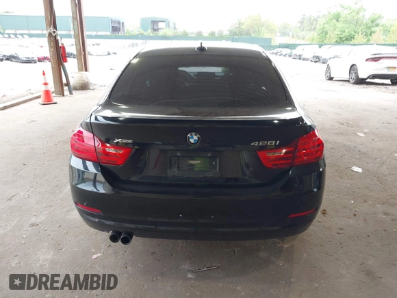 2016 BMW 4 Series 428i xDrive with VIN WBA4C9C58GG139151, listed as a IAAI auction lot 42151827 with 92,698 mi miles and . Bid and sale history available at DreamBid. Image 16.