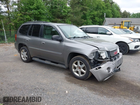 2007 GMC Envoy SLE z VIN 1GKDT13S472253627, wystawiony jako IAAI lot #42292399 z przebiegiem 204 263 mil mil oraz . Historia ofert i sprzedaży dostępna na DreamBid. Obrazek 1.