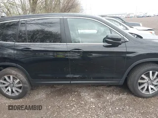 2019 Honda Pilot EX-L with VIN 5FNYF6H55KB071767, listed as a IAAI auction lot 41941696 with 66,844 mi miles and . Bid and sale history available at carsss.com. Image 13.
