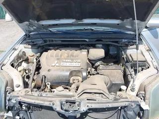 2005 Mitsubishi Galant GTS with VIN 4A3AB76S55E038153, listed as a IAAI auction lot 41995911 with 158,819 mi miles. Bid and sale history available at carsss.com. Image 10.