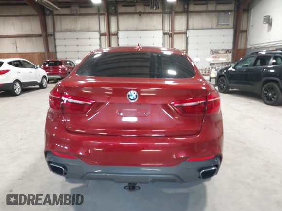 2018 BMW X6 xDrive35i z VIN 5UXKU2C59J0Z62359, wystawiony jako IAAI lot #41866547 z przebiegiem 57 544 mil mil oraz . Historia ofert i sprzedaży dostępna na DreamBid. Obrazek 16.