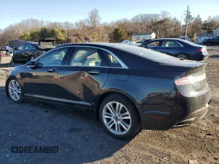 2014 Lincoln MKZ Hybrid z VIN 3LN6L2LU8ER825265, wystawiony jako Copart lot #49480805 z przebiegiem 138 746 mil mil oraz Szkoda całkowita • Salvage title. Historia ofert i sprzedaży dostępna na DreamBid. Obrazek 2.