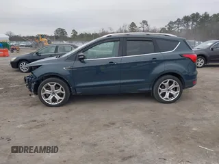 2019 Ford Escape Titanium with VIN 1FMCU9J93KUB84831, listed as a IAAI auction lot 41514146 with 105,072 mi miles. Bid and sale history available at carsss.com. Image 14.
