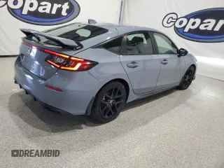 2023 Honda Civic Sport z VIN 19XFL2H89PE020319, wystawiony jako Copart lot #54294065 z przebiegiem 11 192 mil mil oraz Czysty tytuł • Clean title. Historia ofert i sprzedaży dostępna na DreamBid. Obrazek 3.