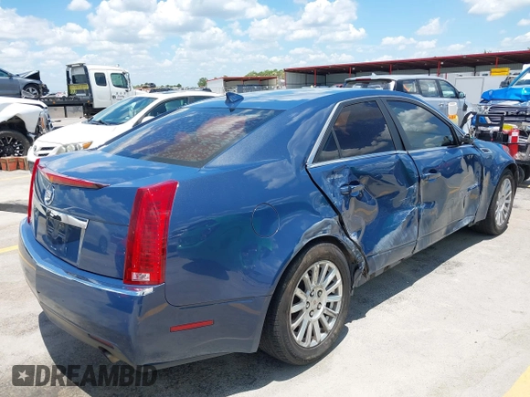 2010 Cadillac CTS Luxury with VIN 1G6DE5EG3A0115377, listed as a IAAI auction lot 42608919 with 191,657 mi miles and . Bid and sale history available at DreamBid. Image 4.